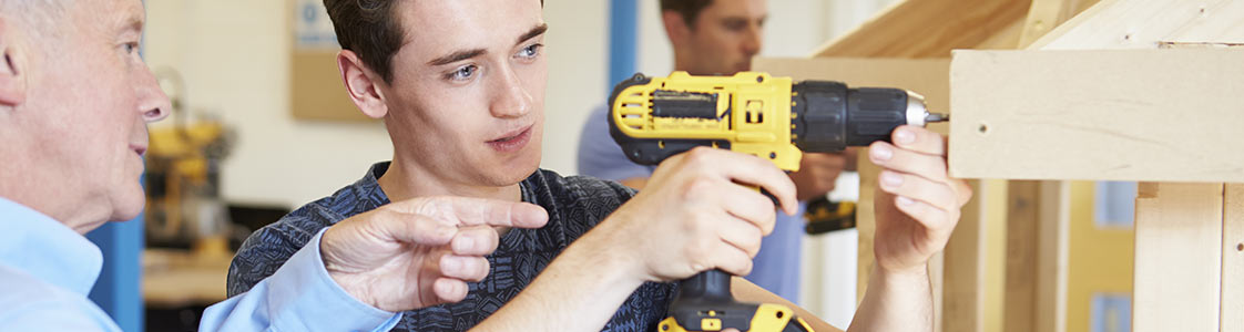 Instruction helping student with drill